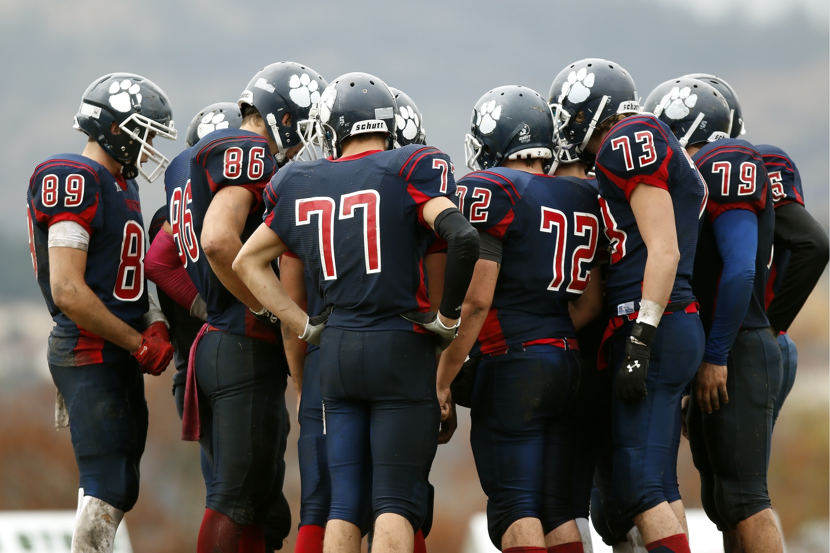 Football players on field.