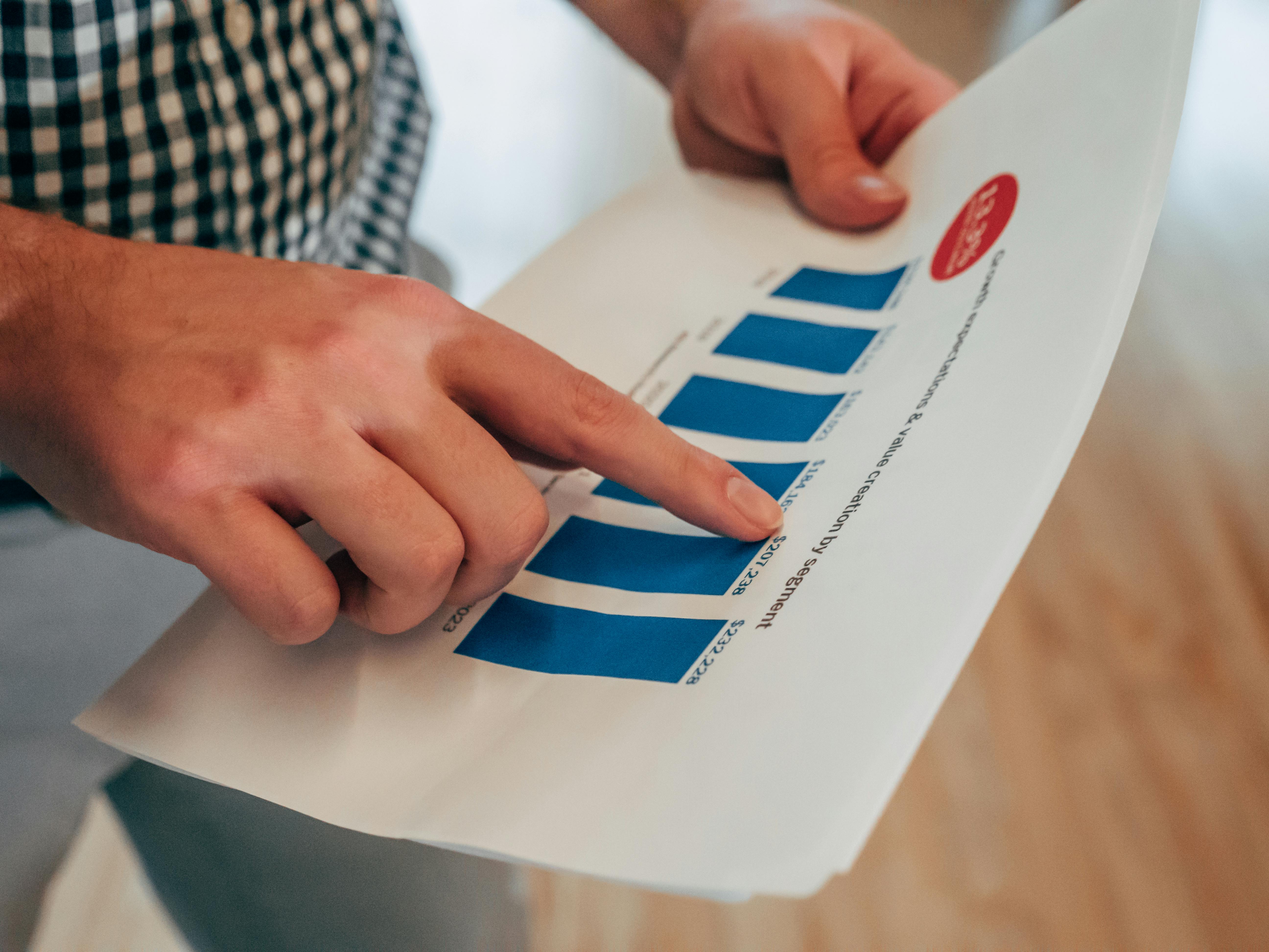 Person looking at financial papers.