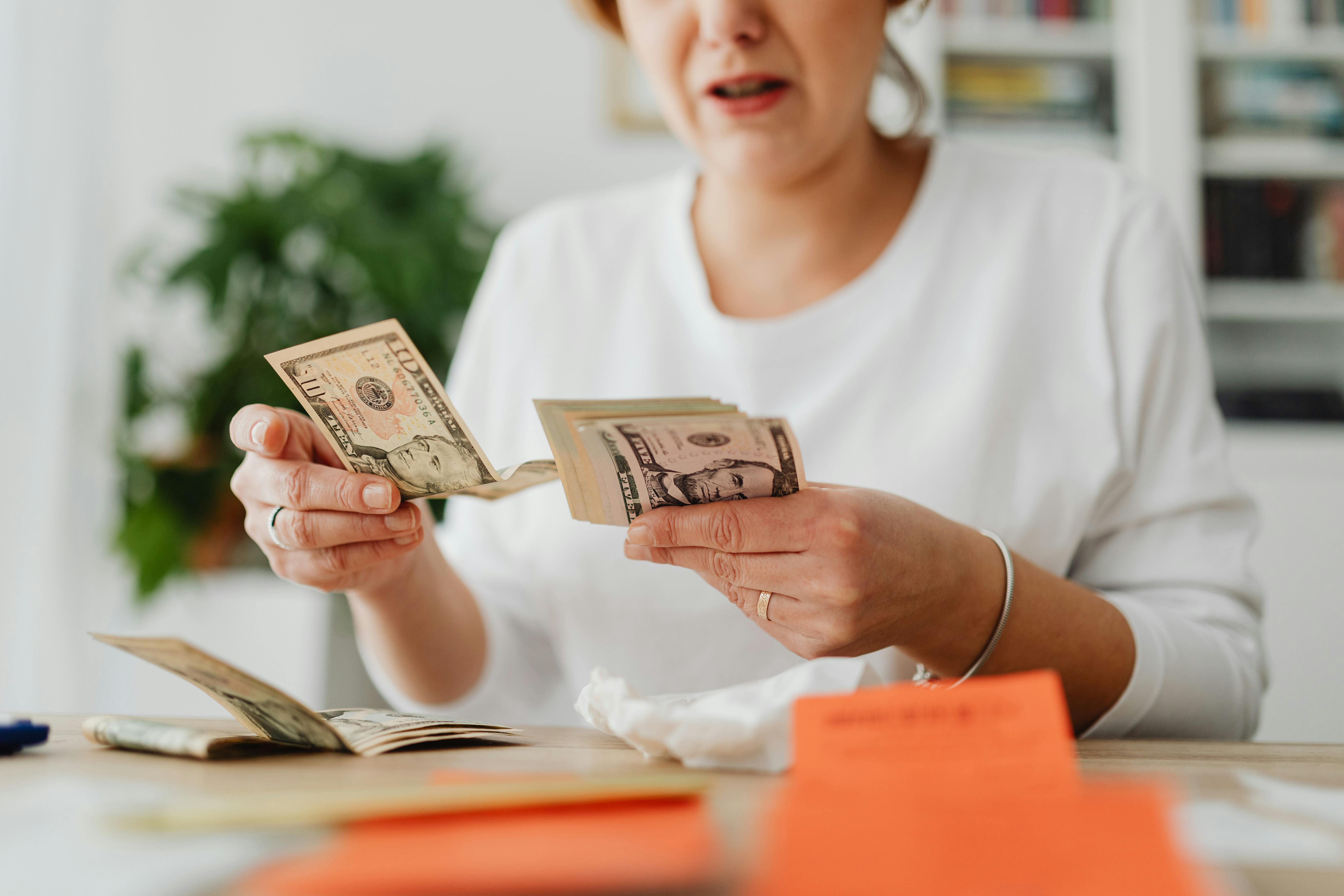 Woman counting money.