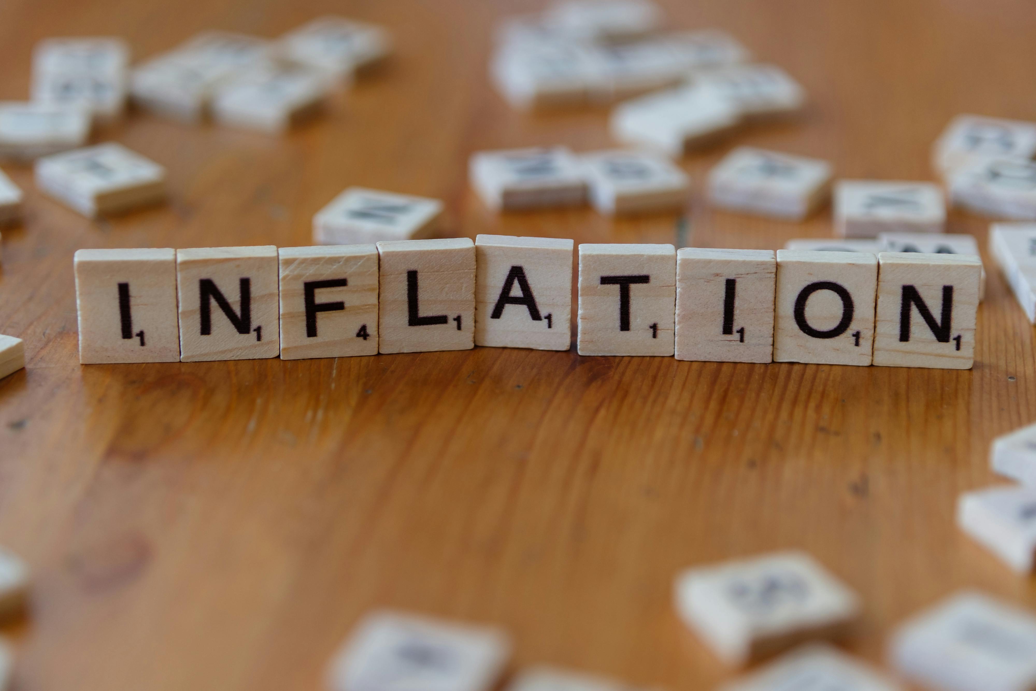 Scrabble letters spelling the word "inflation."