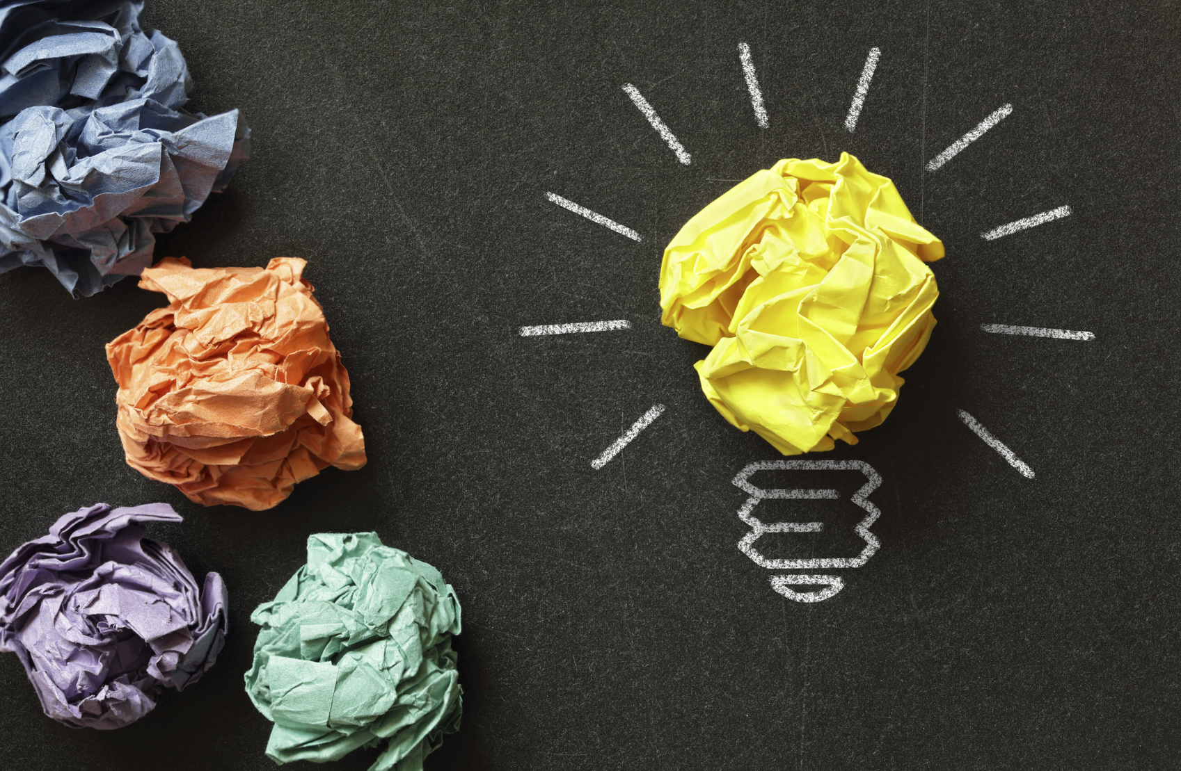 Crumpled paper in blackboard lightbulb art